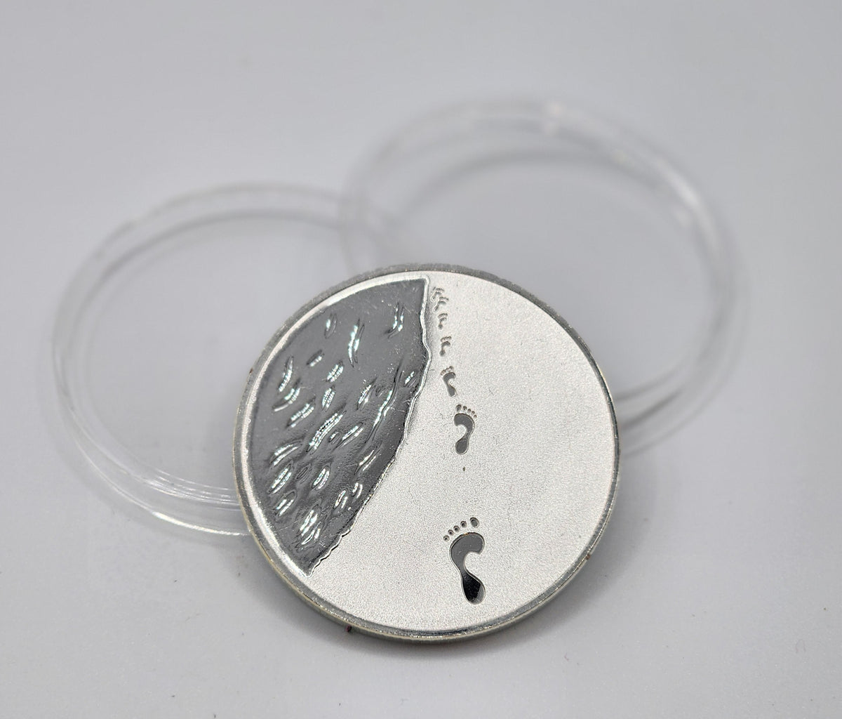 Footprints Coin